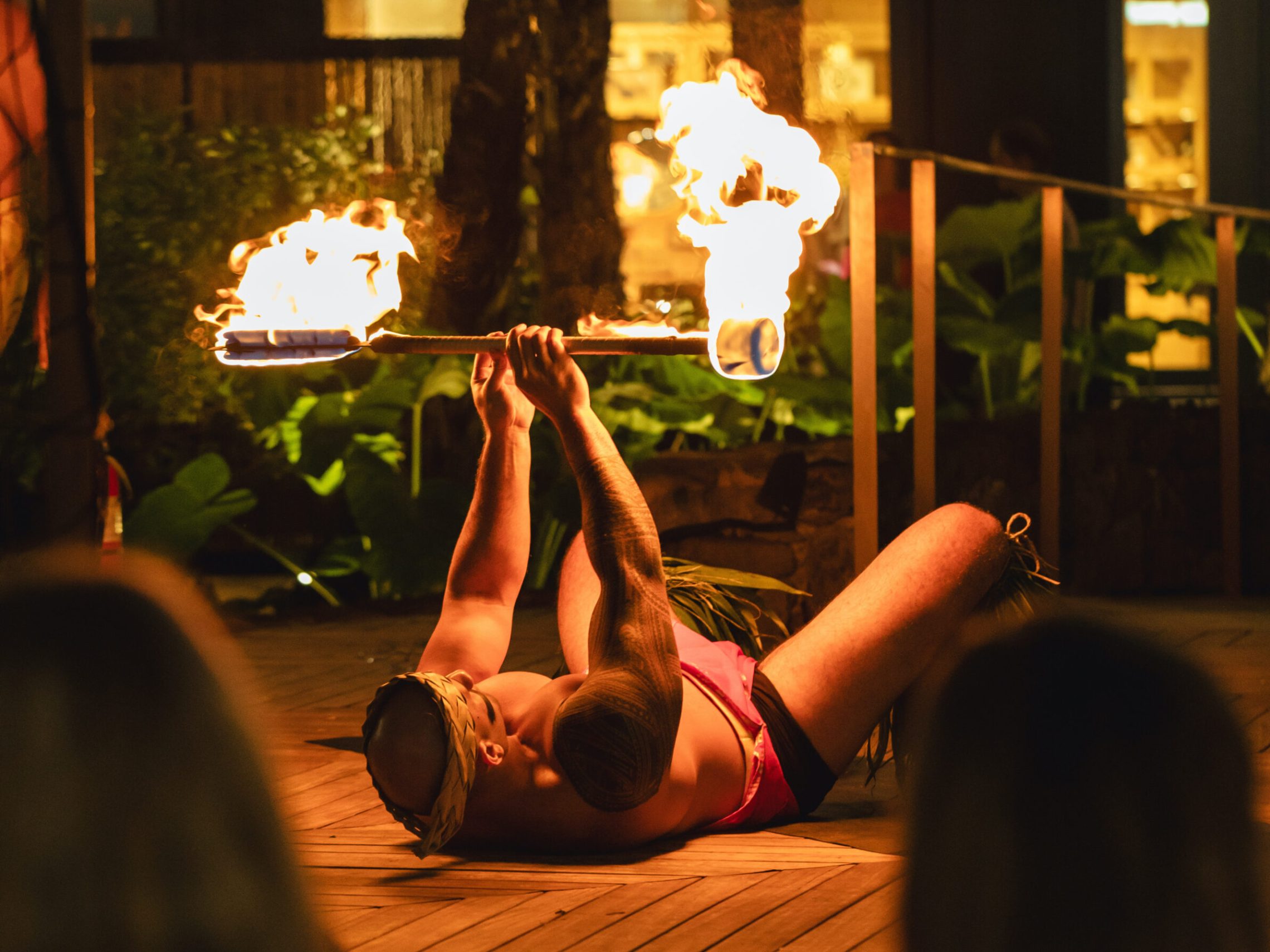 a person sitting in front of a mirror posing for the camera